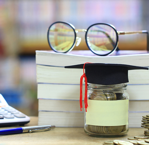 Student working on laptop, representing subject-specific scholarships